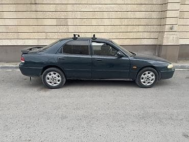Mazda 626: 1995 г., 1.8 л, Механика, Бензин — 3