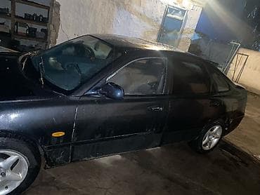 Mazda 626: 1992 г., 2 л, Механика, Бензин, Седан