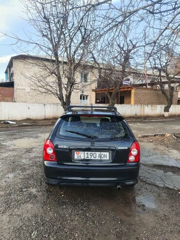 Продажа авто: Mazda 323: 2003 г., 1.6 л, Механика, Бензин, Универсал — 6