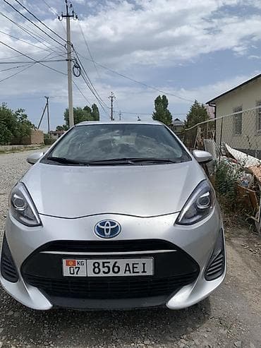 byd e7: Toyota Aqua: 2020 г., 1.5 л, Автомат, Гибрид, Хэтчбэк — 2