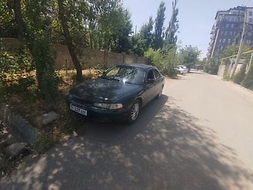 Mazda 626: 1992 г., 1.8 л, Механика, Бензин, Седан