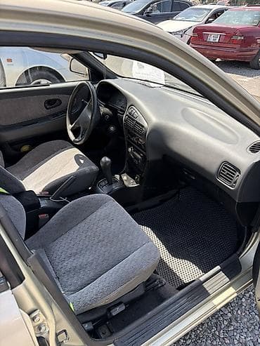 хунчи авто: Mitsubishi Lancer: 1995 г., Универсал — 5