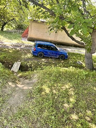 авто масла: Subaru Forester: 2002 г., 2 л, Автомат, Универсал — 1