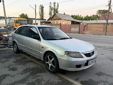 мазда фамиля: Mazda Familia: 2002 г., Механика, Бензин, Универсал — 3
