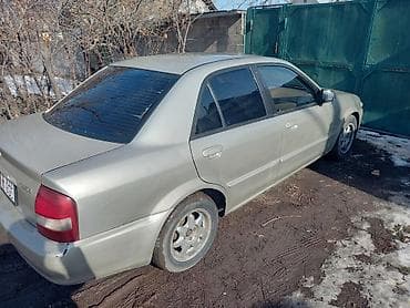 bmw 720: Mazda Protege: 2000 г., 1.6 л, Автомат, Бензин, Седан — 7