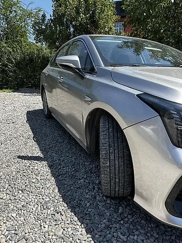 диффузор w220: GAC Aion S — электрический седан серо‑серебристого цвета. Основные — 2