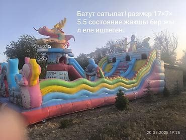 бык игрушка: Надувной игровой комплекс/батут с горками и тематическими фигурами. - — 1