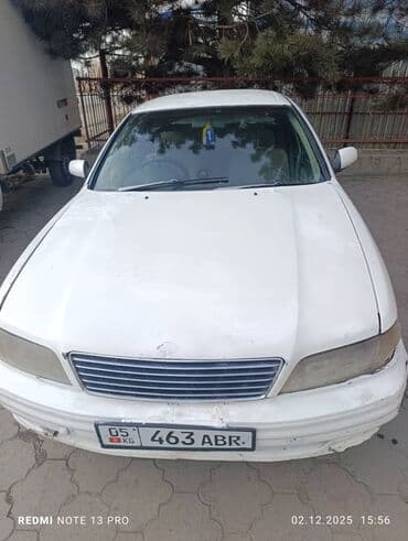 продаю авто в рассрочку без банк: Легковой седан белого цвета с правым рулем. Кузов: - 4 двери — 8