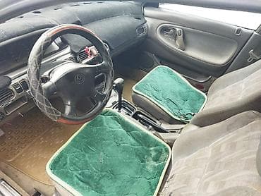 кузов таза: Mazda 626: 1992 г., Лифтбек — 6