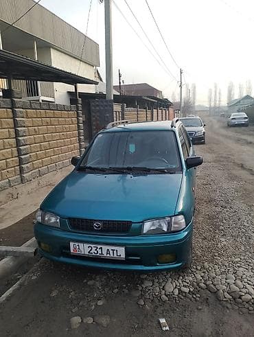 deu labo: Mazda Demio: 1999 г., 1.3 л, Механика, Бензин, Минивэн — 3