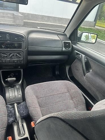 электронные скутера: Volkswagen Vento: 1993 г., 1.8 л, Автомат, Бензин, Седан — 9