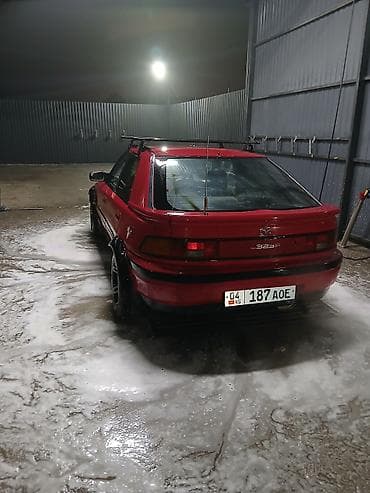 тенир тоо: Mazda 323: 1990 г., 1.6 л, Кол менен иштөөчү, Бензин, Хетчбек — 2
