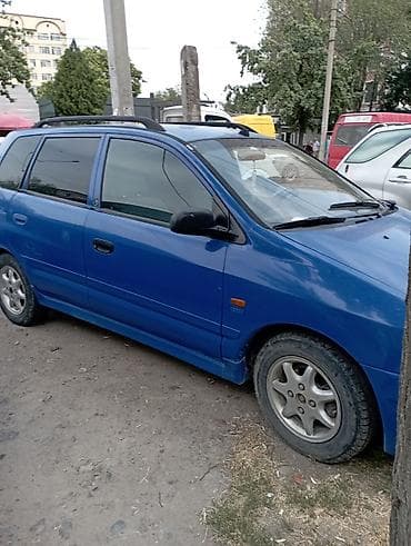Транспорт: Mitsubishi Space Star: 1999 г., 1.8 л, Механика, Универсал — 6