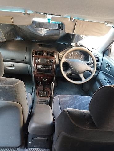 zimmer e9 pro: Mitsubishi Galant: 1998 г., 2.5 л, Автомат, Бензин, Универсал — 5