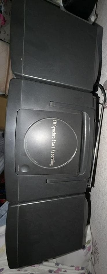 Аудиотехника: Музыкальный центр Philips AZ9340 с акустикой Bass Reflex - Формат — 2
