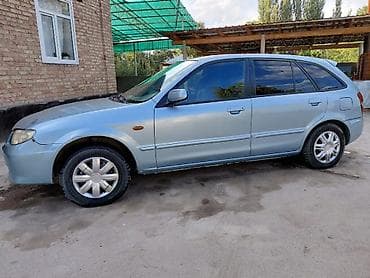 Mazda 323: 2000 г., 1.6 л, Автомат, Бензин, Хэтчбэк — 1