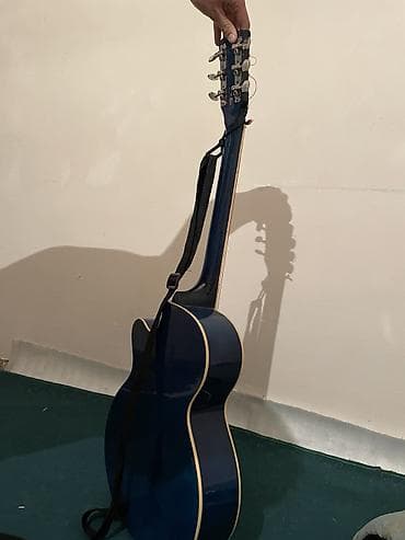 Комузы: Акустическая гитара с вырезом (cutaway), корпус формата — 2