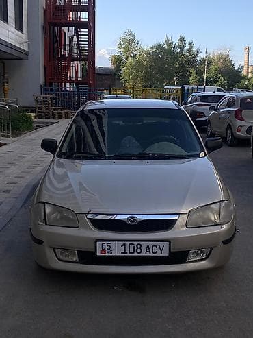 step rf3: Mazda 323: 1998 г., 1.5 л, Механика, Бензин, Седан — 2