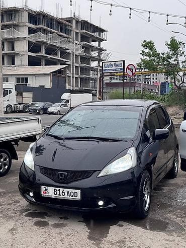 Транспорт: Honda Fit: 2009 г., 1.3 л, Механика, Бензин, Хэтчбэк — 1