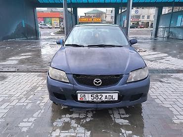 Mazda 323: 2001 г., 1.6 л, Механика, Бензин, Хэтчбэк