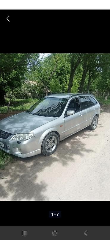 Mazda 323: 2003 г., 1.6 л, Механика, Бензин, Универсал