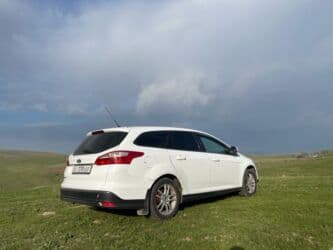 шкода практик: Ford Focus: 2012 г., 1.6 л, Механика, Бензин, Универсал — 12