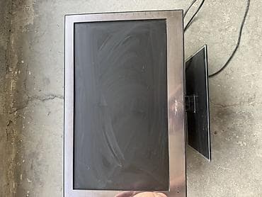 LCD-телевизор SUPRA, диагональ 19–22" (примерно). Классический плоский