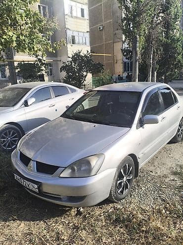 grand cherokee: Mitsubishi Lancer: 2007 г., 1.6 л, Автомат, Седан — 9