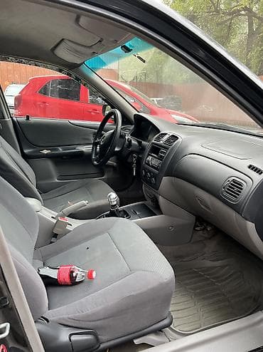 продам мазда 323: Mazda 323: 2002 г., 1.3 л, Механика, Бензин, Хэтчбэк — 5