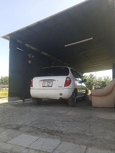 задние фары нексия 2: Toyota Duet: 2000 г., Автомат, Хэтчбэк — 5
