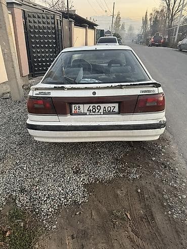 помпа мазда 626: Mazda 626: 1988 г., Седан — 3