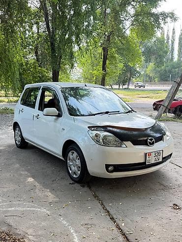 айни 95: Mazda Demio: 2005 г., 1.5 л, Автомат, Бензин — 3