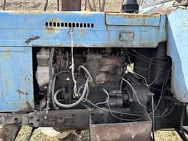 Тракторы ХТЗ: Трактор колесный с кабиной, класс тяги примерно 1,4–2,0 (типовая — 9