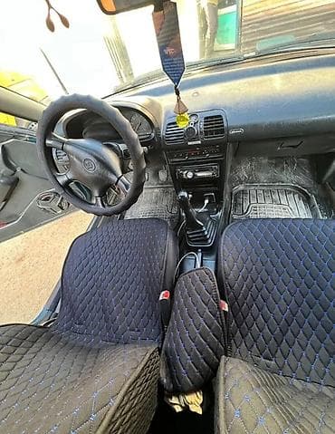 Продажа авто: Mazda 323: 1994 г., 1.6 л, Механика, Бензин, Хэтчбэк — 2