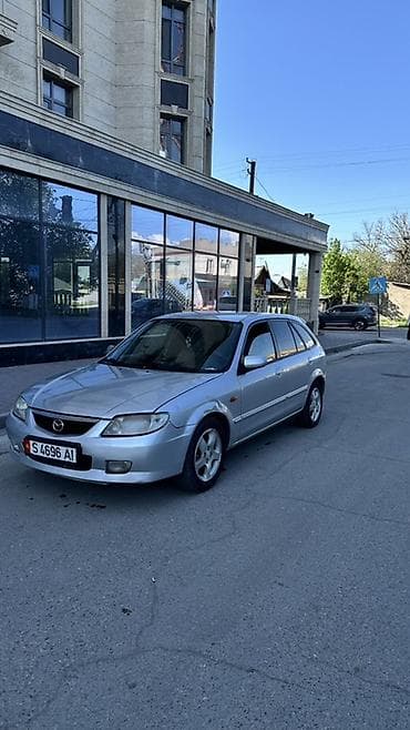 mini kooper: Mazda 323: 2001 г., 1.6 л, Ручные, Бензин, Хэтчбэк — 1