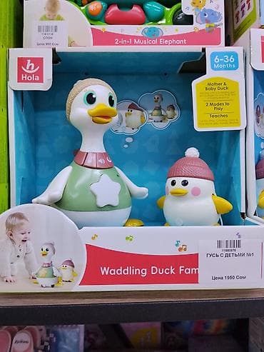 Игрушки: Игрушка Hola «Waddling Duck Family» — мама-утка с утятами. Описание — 1