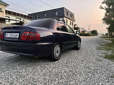 муссо автомобиль: Mitsubishi Carisma: 2000 г., Газ, Седан — 3