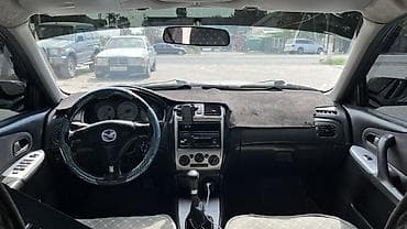 продаю mazda 323: Mazda 323: 2002 г., 1.6 л, Механика, Бензин, Хэтчбэк — 7