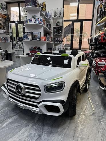 Детский мир: Детский электромобиль Mercedes-Benz (стиль внедорожника), двухместный — 1