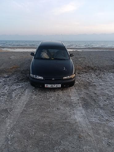 ml 163: Mazda 626: 1992 г., Седан — 3