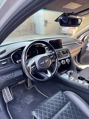 genesis g90 цена: Genesis G70 — спортивный седан бизнес‑класса в серебристом цвете — 6