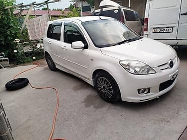 black edition: Mazda Demio: 2004 г., Хэтчбэк — 7