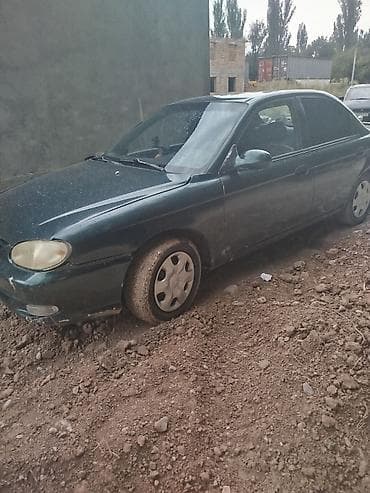 Транспорт: Kia Sephia: 1998 г., 1.5 л, Механика, Бензин, Седан — 4