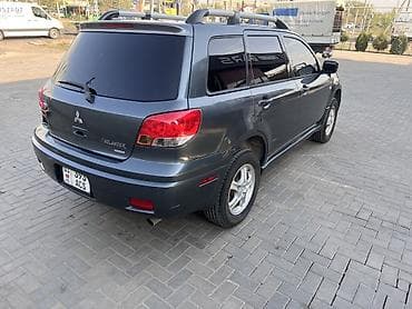 215 60 16 шина: Mitsubishi Outlander: 2003 г., 2.4 л, Автомат, Бензин, Кроссовер — 2