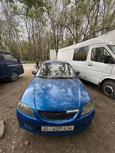 124 молдинг: Mazda 323: 2001 г., 1.6 л, Хэтчбэк — 2