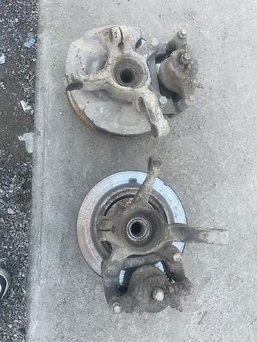 Автохимия: Поворотные кулаки в сборе с тормозными механизмами (пара) Suzuki alto — 2