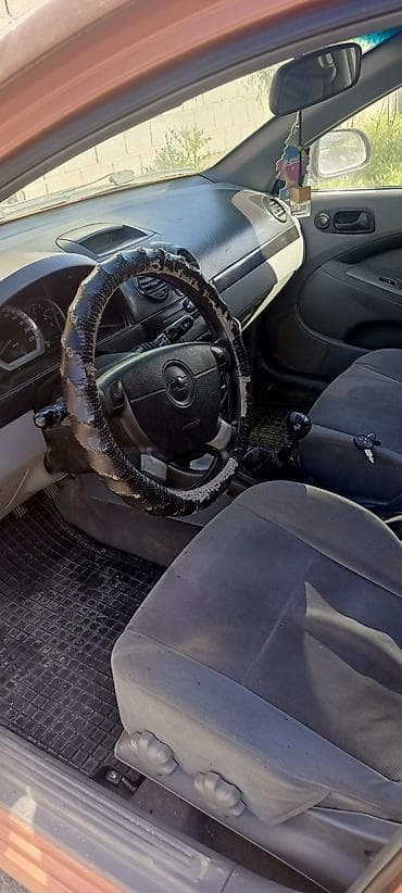 ford focus 2002: Chevrolet Lacetti: 2006 г., Механика, Бензин, Хэтчбэк — 4