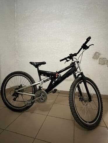 Горный велосипед с двухподвесной рамой Основные характеристики: -