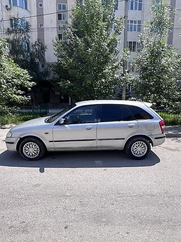 сузики вагон: Mazda 323: 2000 г., 1.6 л, Механика, Бензин, Универсал — 2