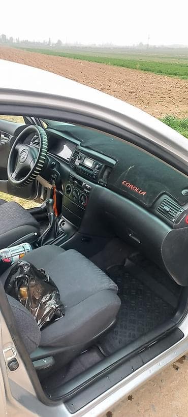 mini kuper: Toyota Corolla: 2004 г., Бензин, Седан — 8